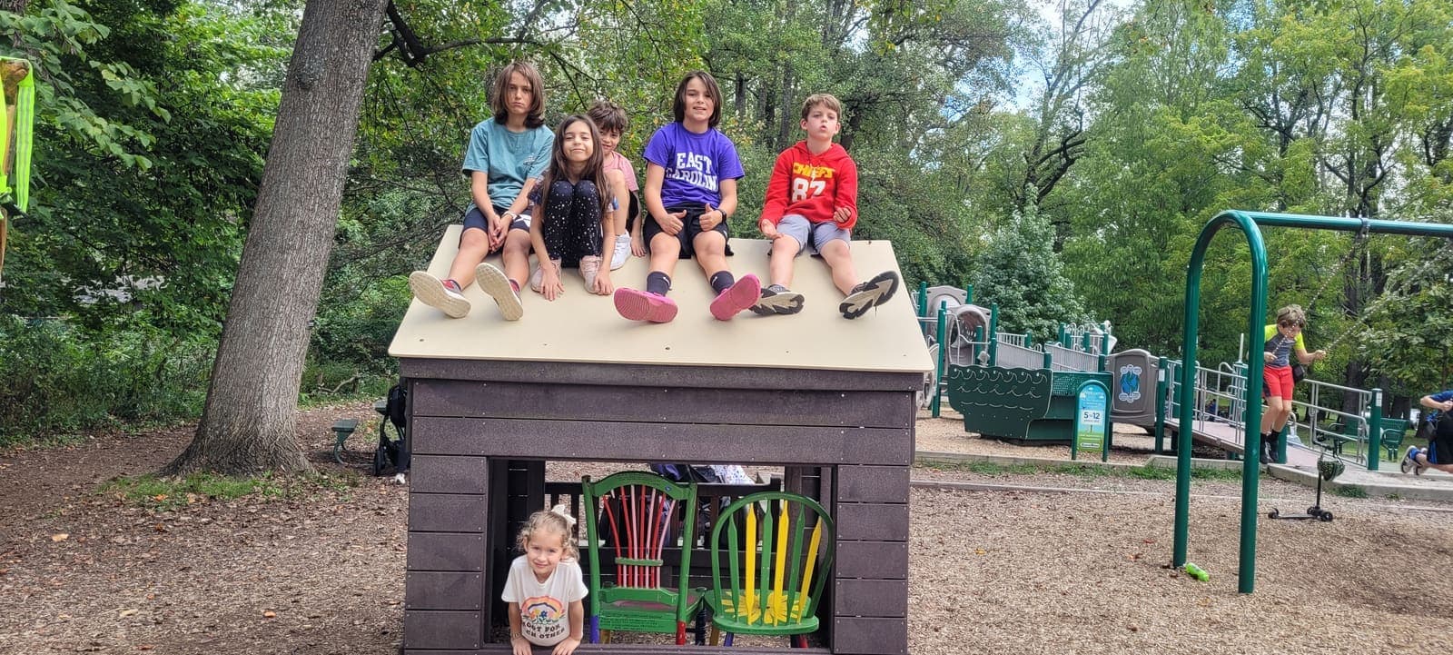Discovery learners on the playhouse outdoors