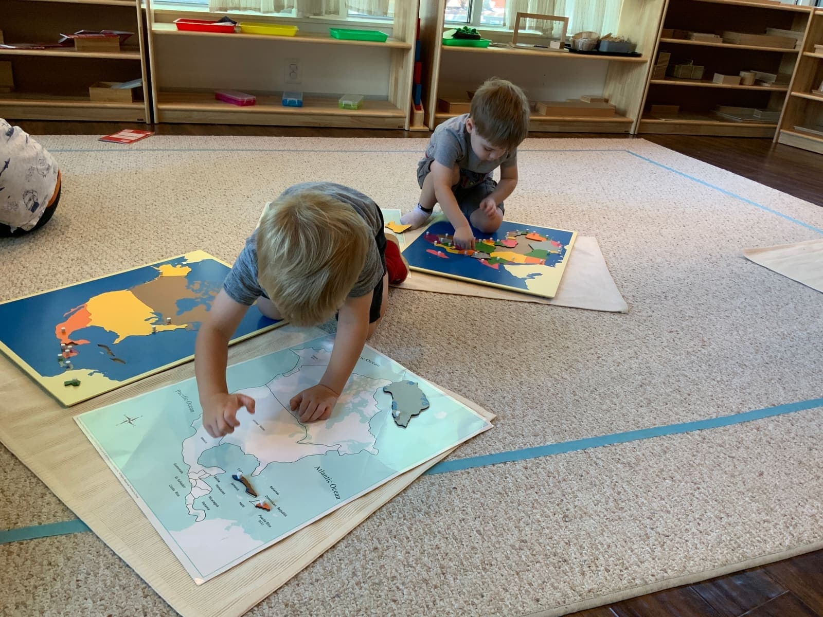 Working with the Montessori world map puzzles