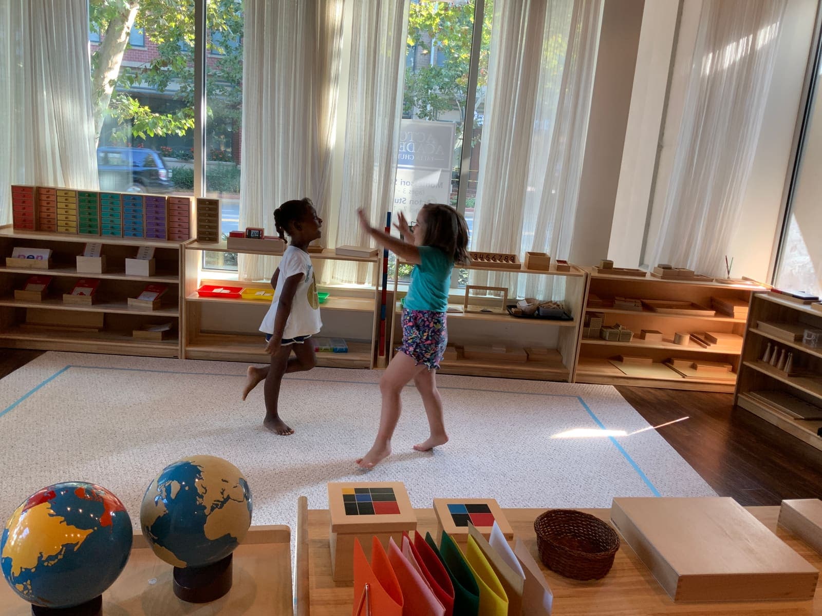 Spark learners in the studio with the world globes